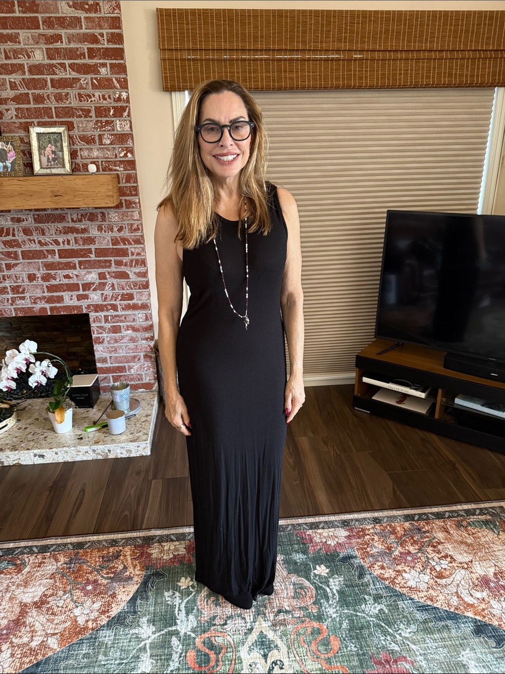 Sleeveless hooded black maxi dress